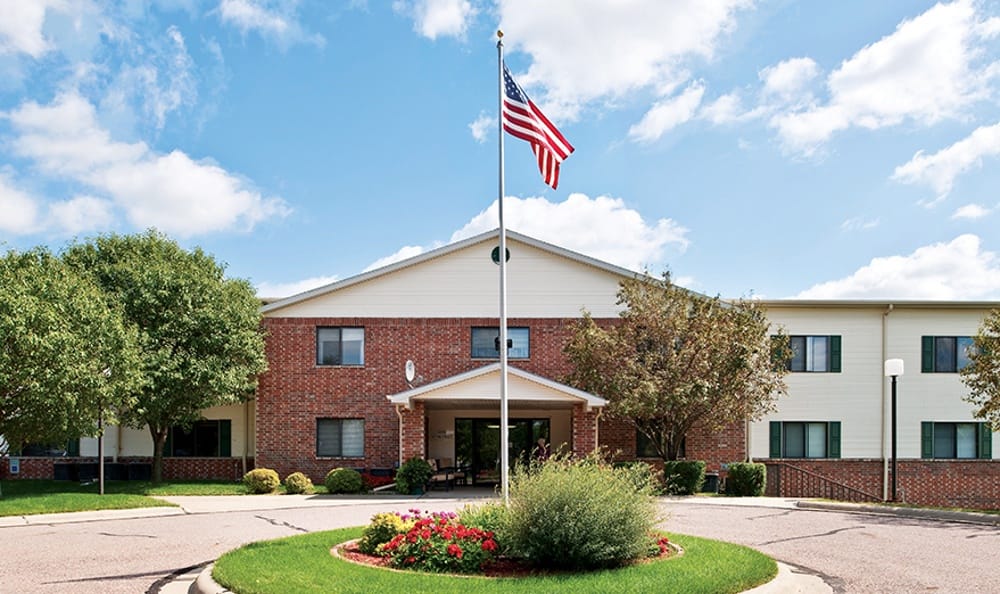 Exterior view of the facility with American flag.