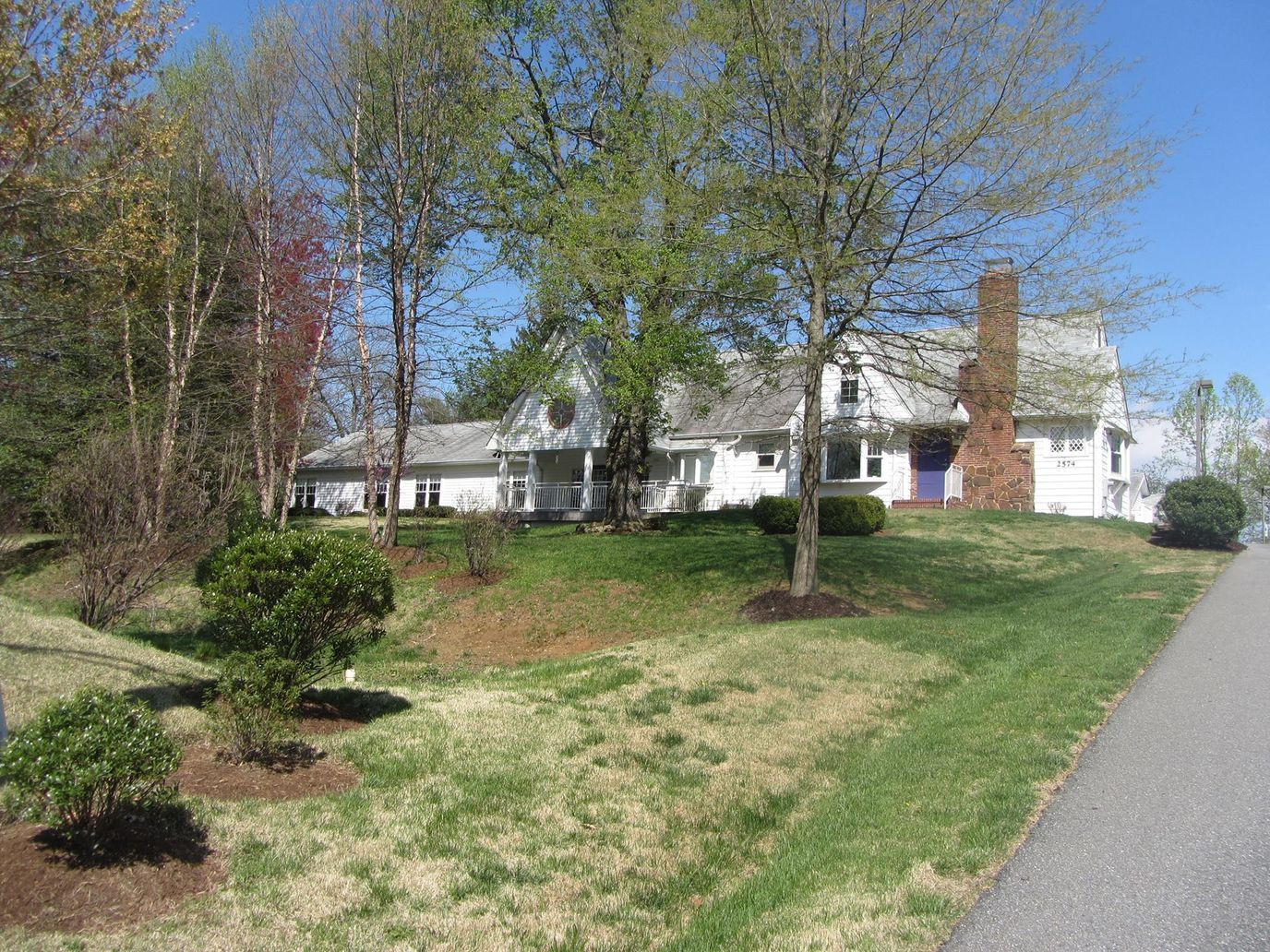 Exterior view of La Casa LLC surrounded by trees