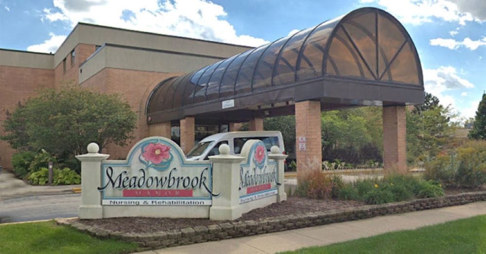 Entrance of Meadowbrook Naperville facility with signage