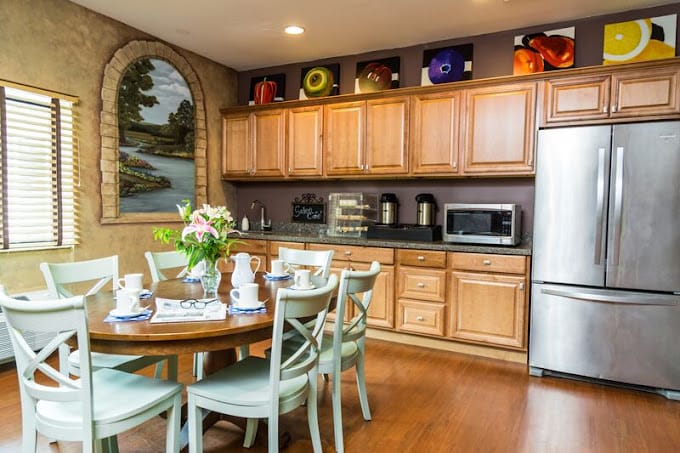 Bright dining area with a table set for meals