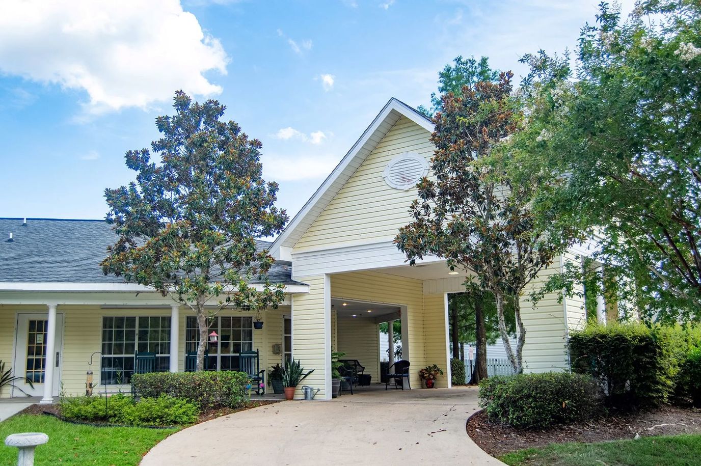 Exterior view of River Chase Village entrance with gardens