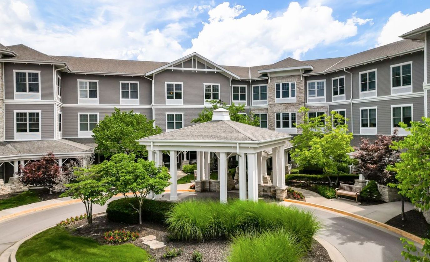 Nice view of the building entrance and surrounding landscaping