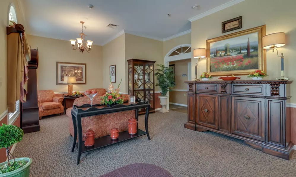 Interior view of a cozy common area with seating and decor