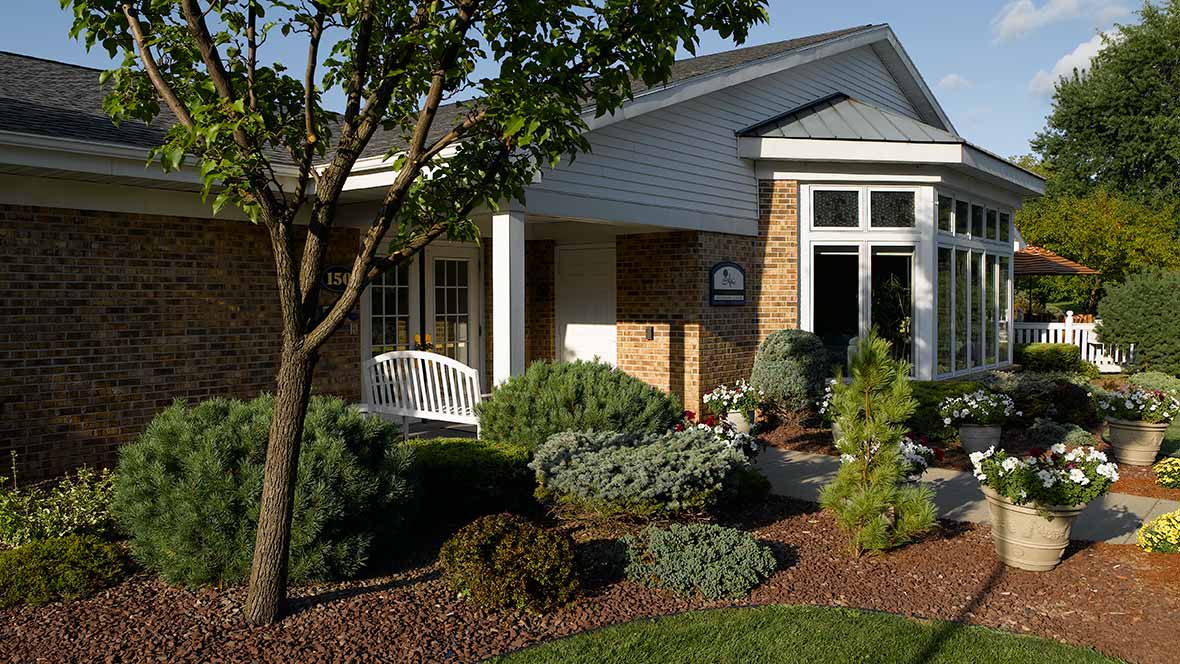 Exterior view of a senior living facility entrance