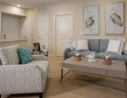 Cozy living room with comfortable furniture and artwork