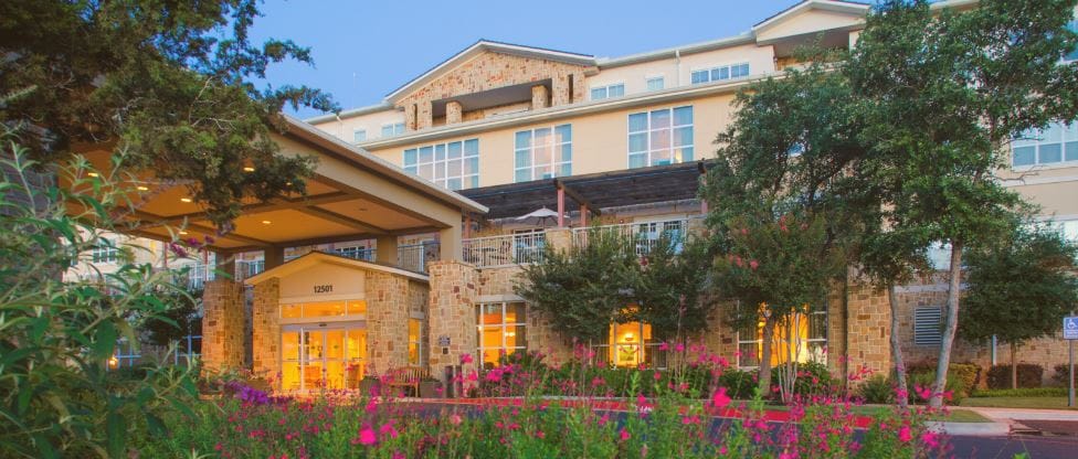 Exterior view of Longhorn Village with landscaping