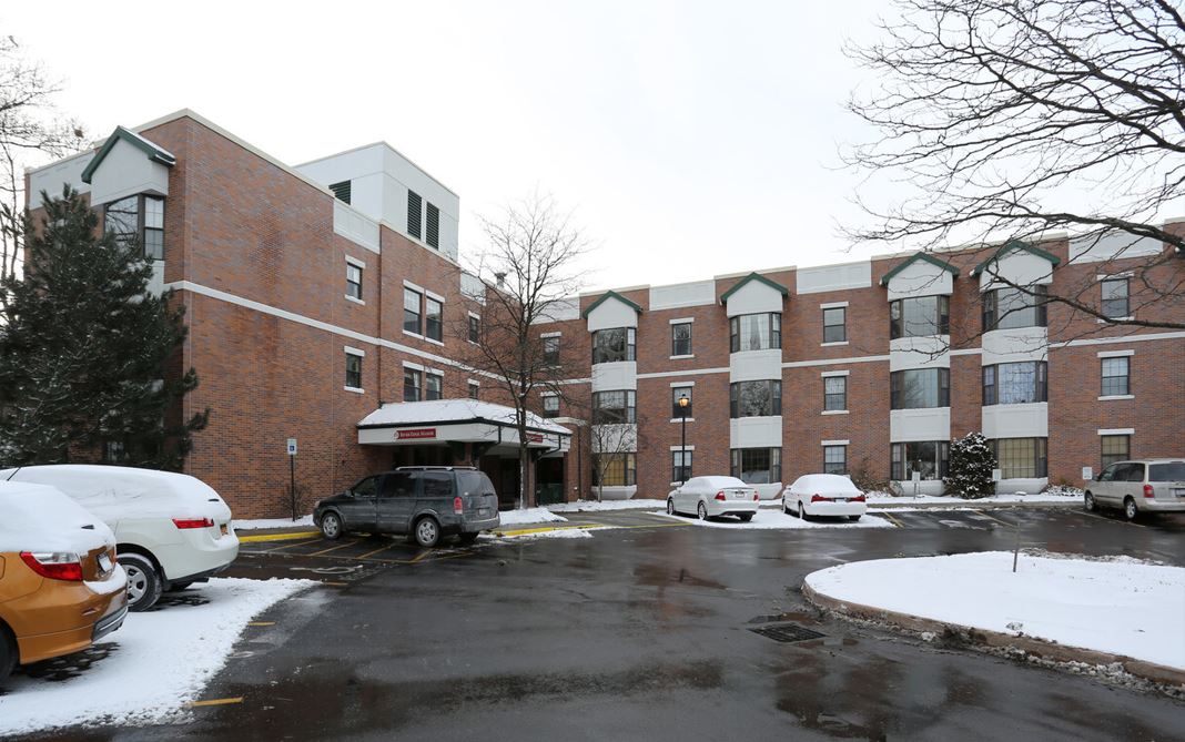 Exterior view of River Edge Manor in winter.