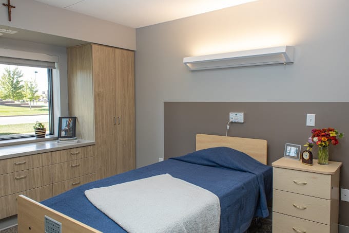 Cozy private resident room with a bed and decorations