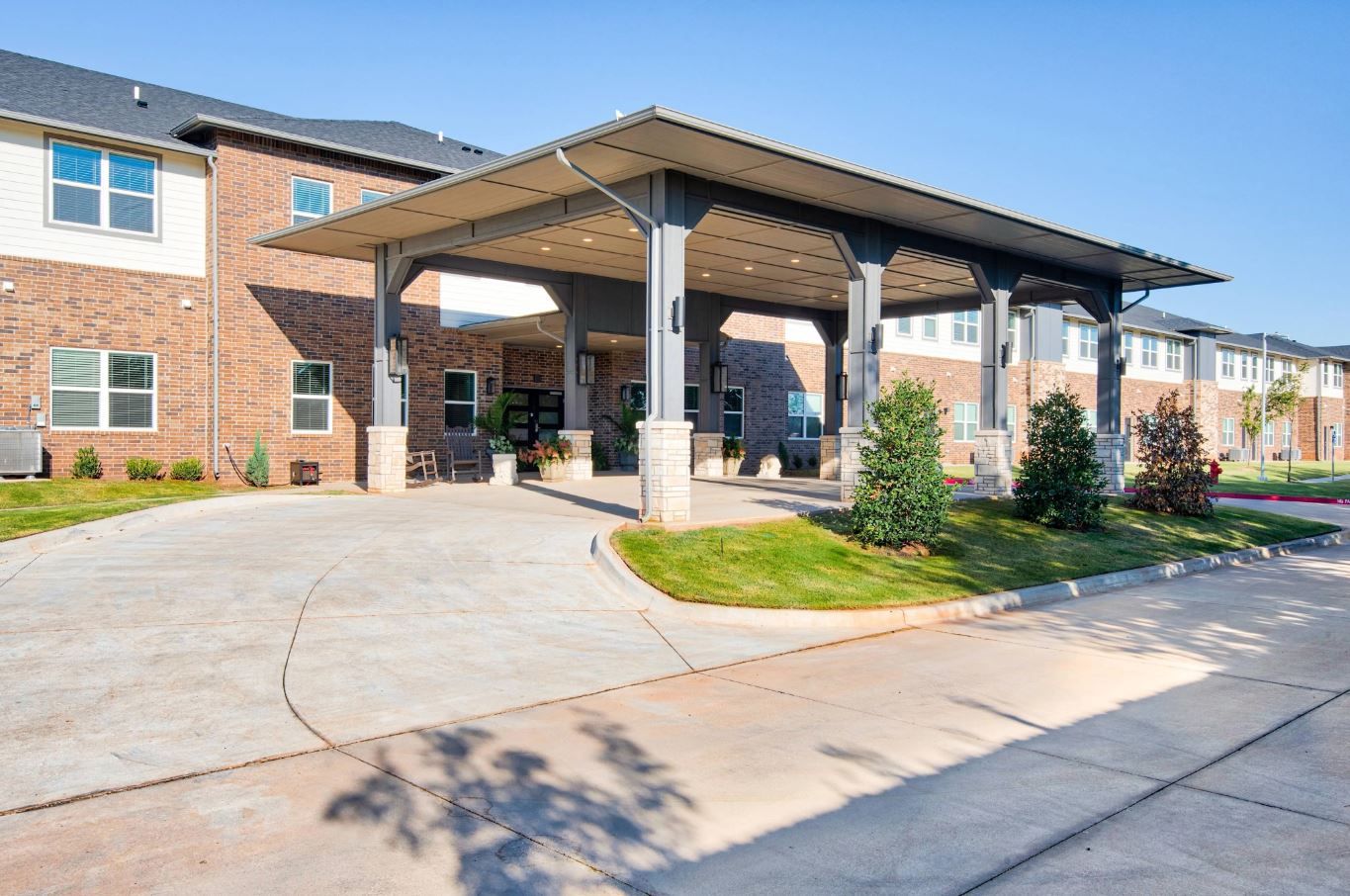 Front entrance of The Carlstone facility with awning