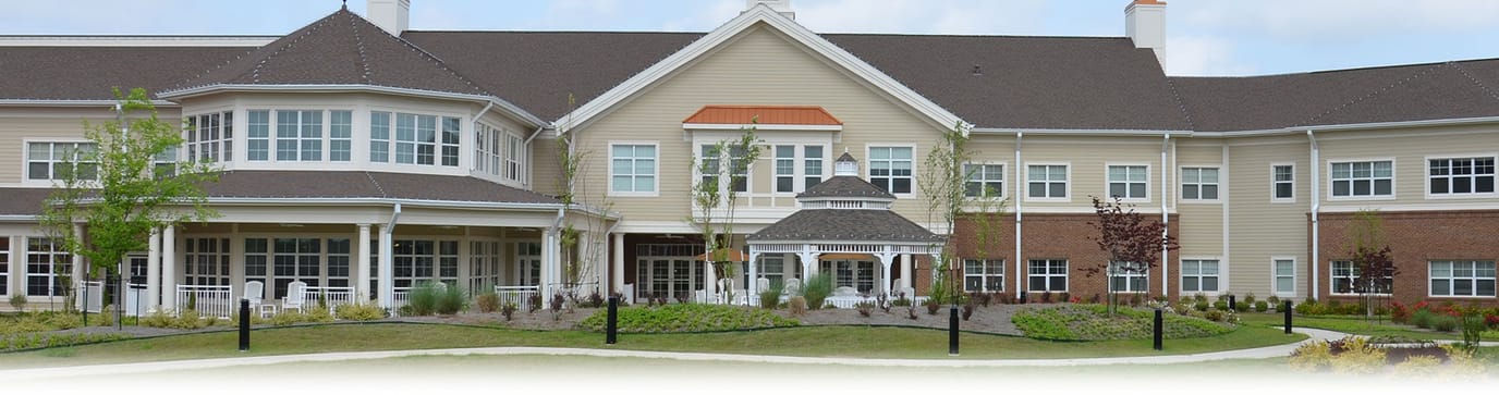 Exterior view of a assisted living facility with outdoor space
