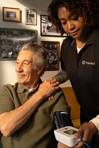 Senior man receiving a blood pressure check