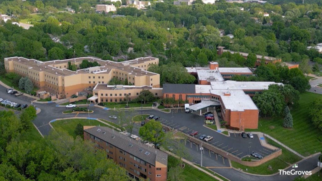 Aerial view of Forest View Senior Living facility surrounded by greenery.