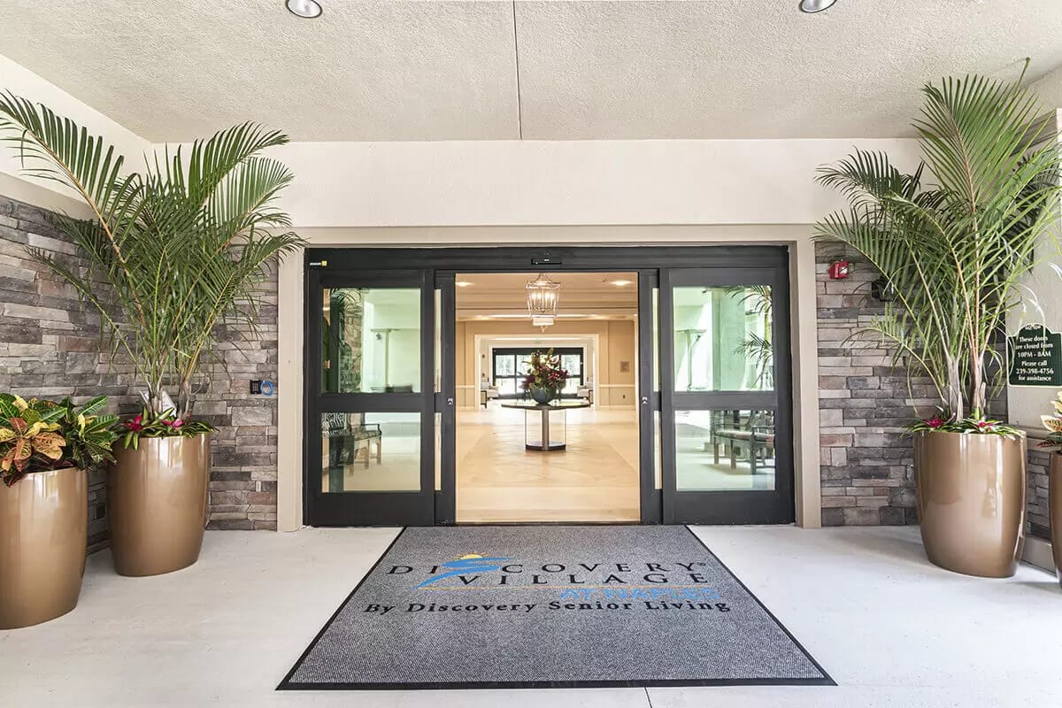 Entrance to Discovery Village with potted plants