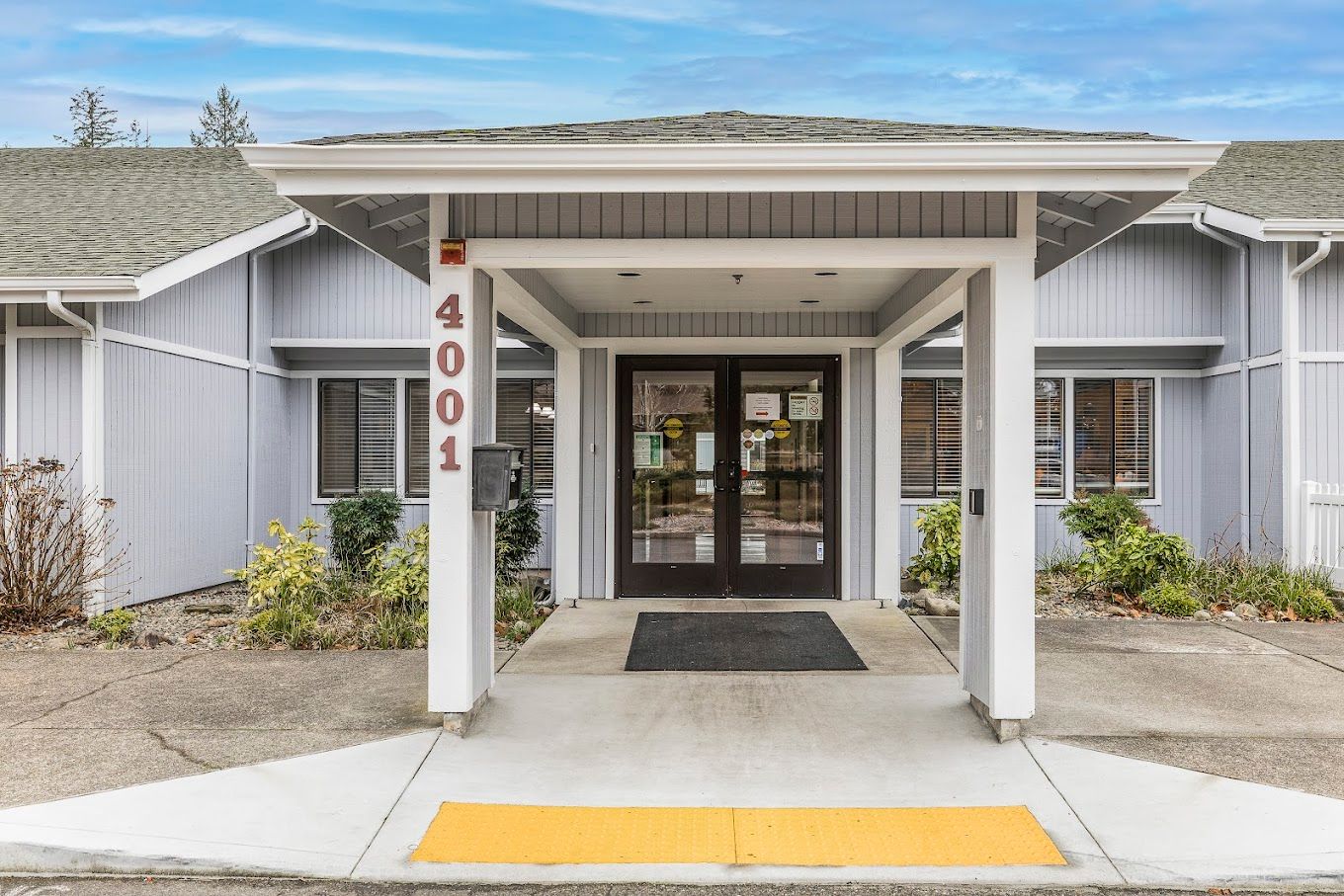 Entrance of Puget Health Care Center with clear signage