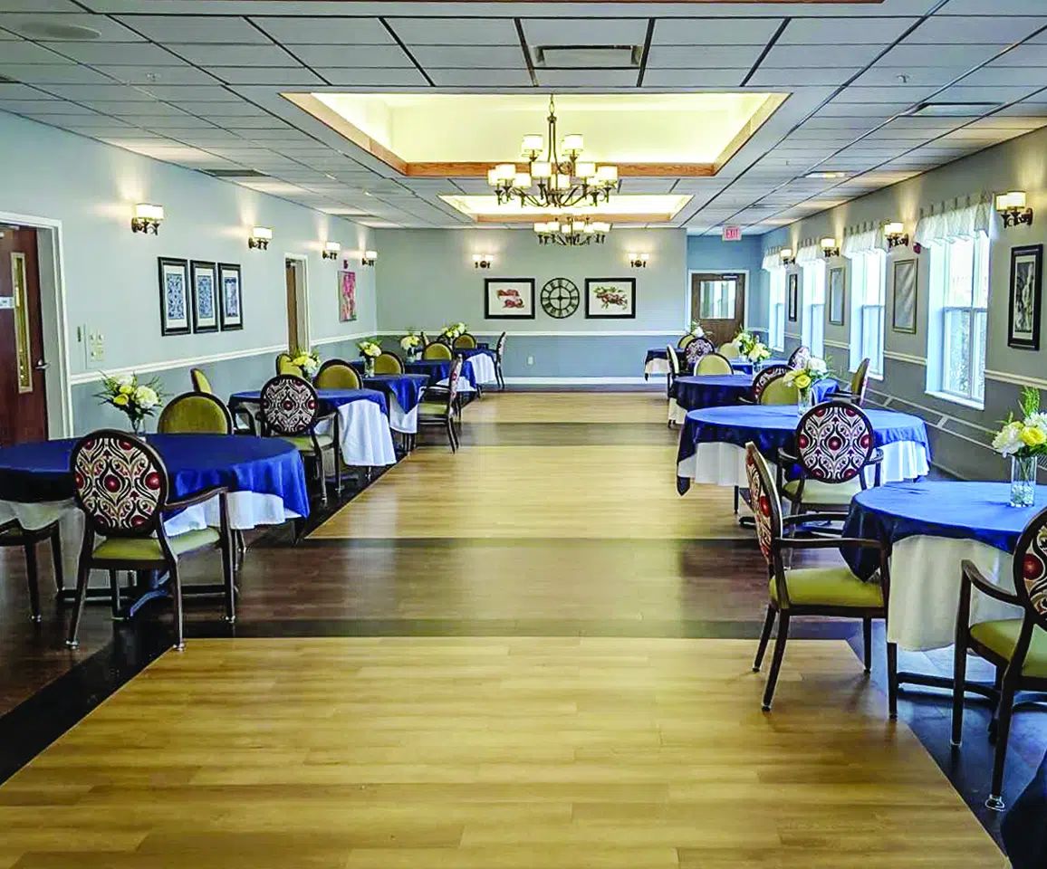 Willowbrook Place, assisted living in Thiensville, WI — Dining area with elegantly set tables and chairs