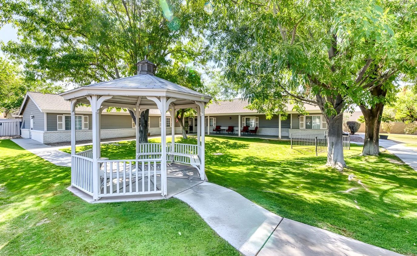 Outdoor gazebo in a green lawn area