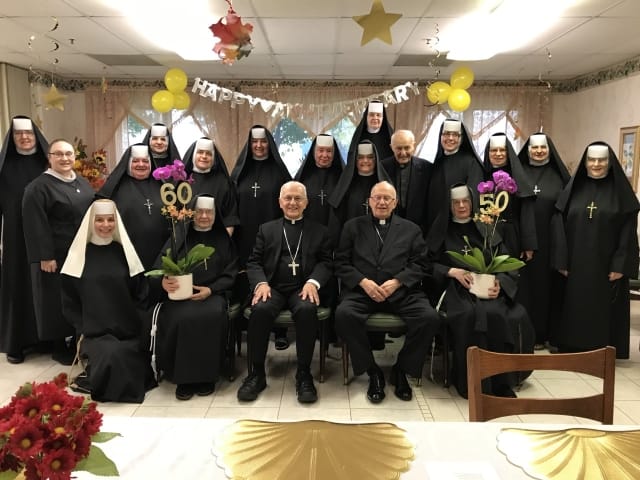 Residents and staff celebrating a milestone birthday event