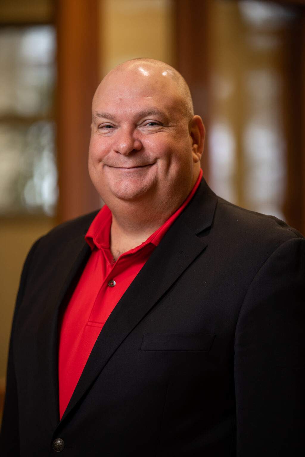 FirstLight Home Care Huntsville, home care in Huntsville, AL — Portrait of a smiling man in professional attire