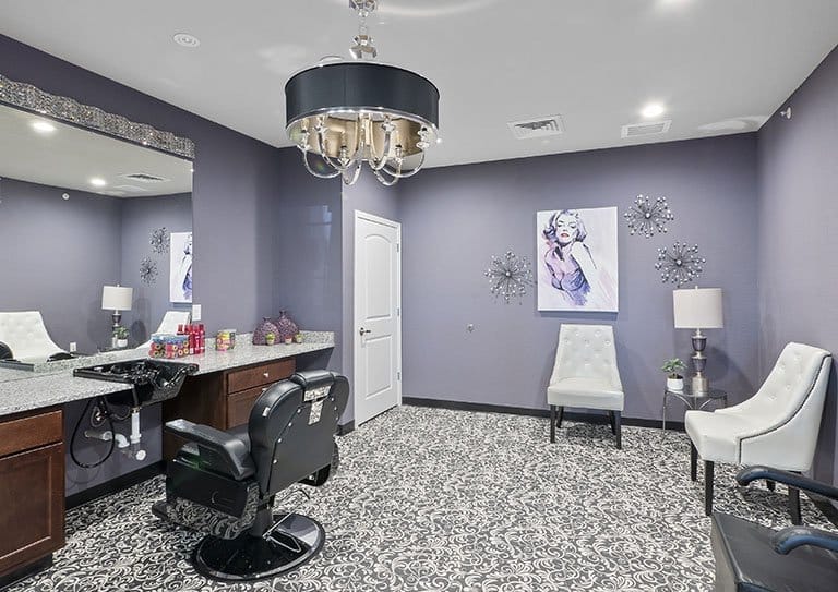 Hampton Manor of Dundee, assisted living in Dundee, MI — Hair salon interior with modern decor and lighting