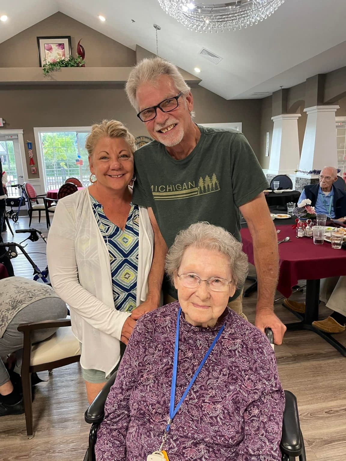 Hampton Manor of Dundee, assisted living in Dundee, MI — Three people posing together in a dining area