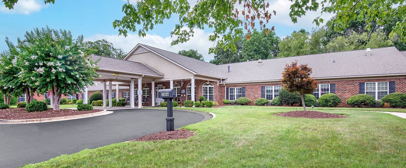 Exterior view of Brookdale Peachtree with landscaped grounds