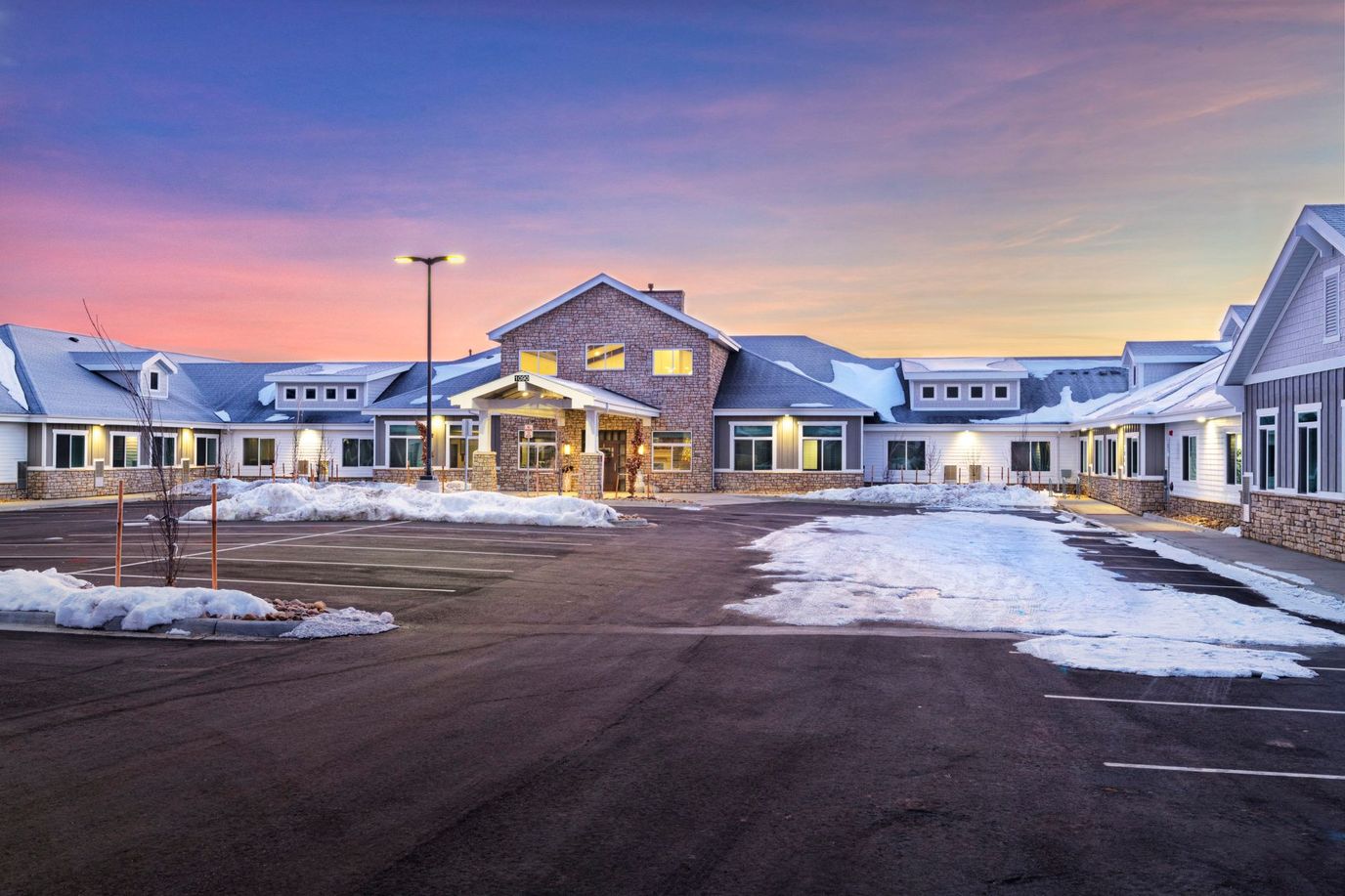 Exterior view of Greeley Village at sunset