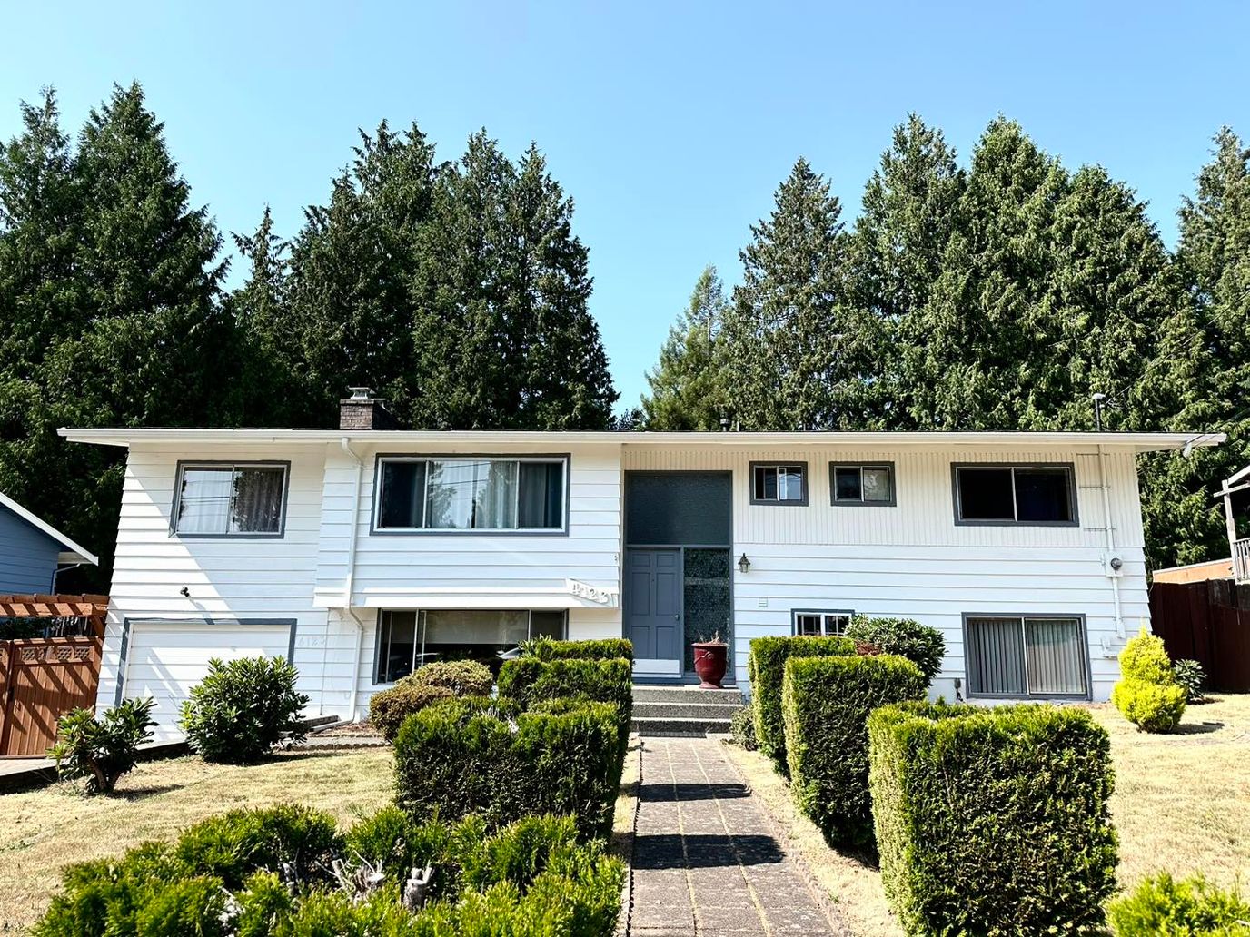 Exterior view of a senior care facility with landscaping