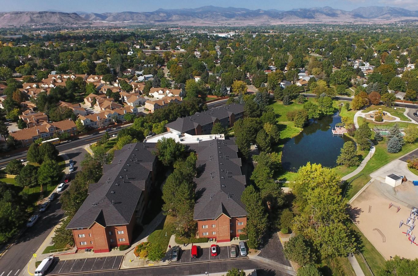 Aerial view of Springwood Retirement Campus with a nearby pond