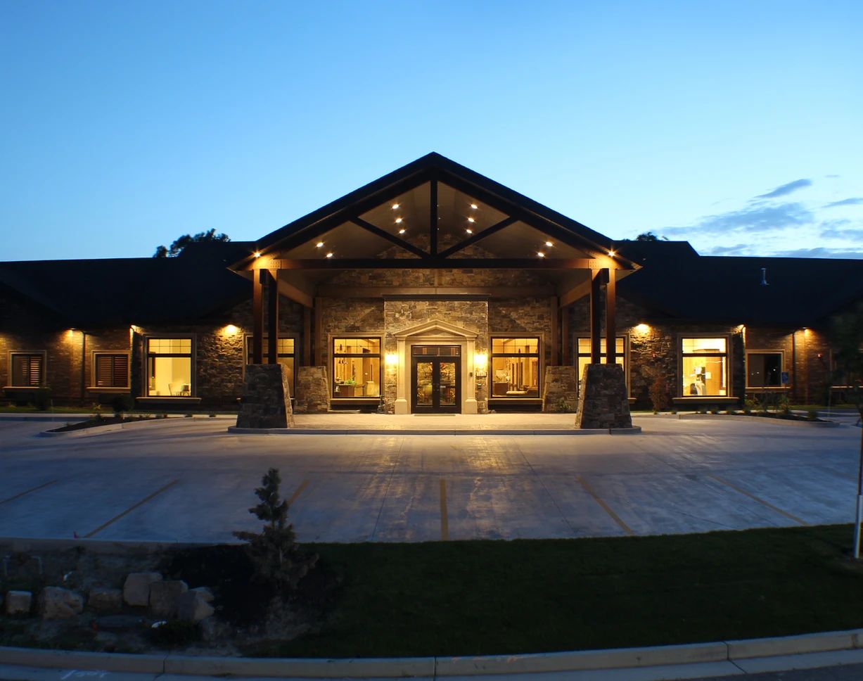 Exterior view of the Stonehenge of South Jordan entrance at dusk