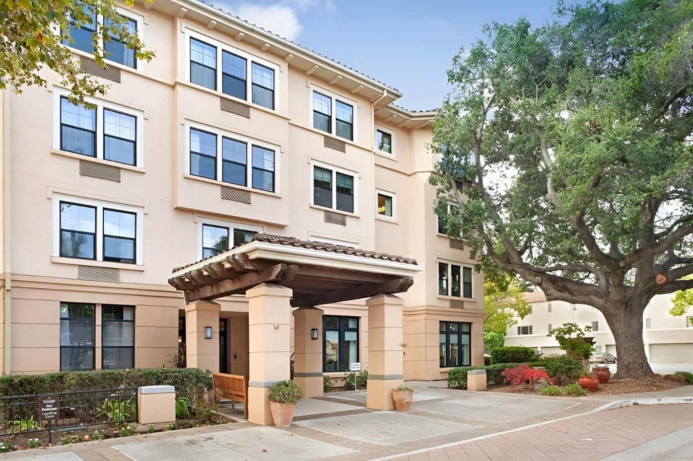 Exterior view of assisted living facility with entrance