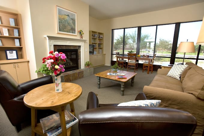 Bright common area with seating and natural light