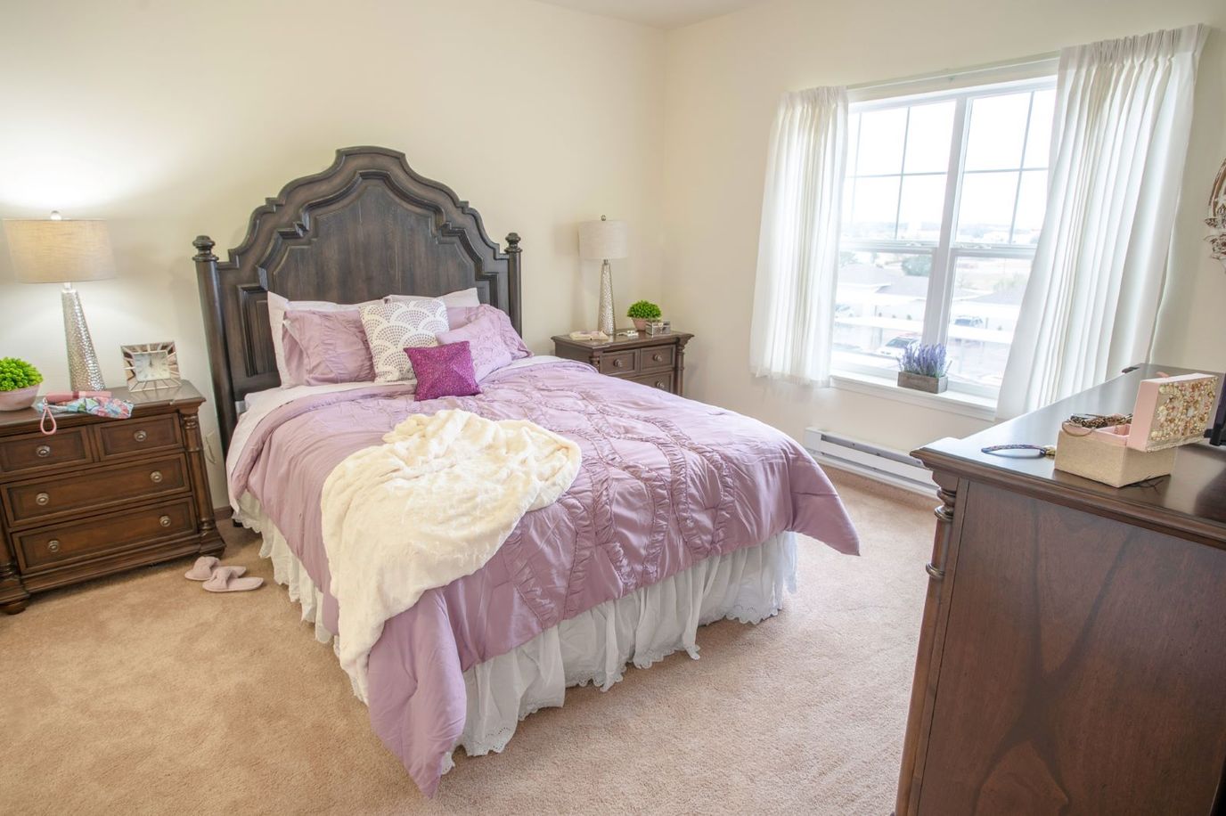 Cozy resident room with a bed and furnishings