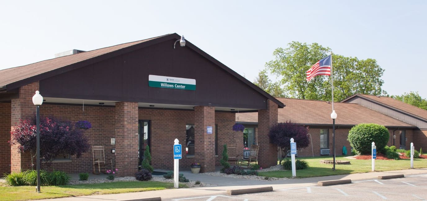 Exterior view of the Willows Center facility with landscaping