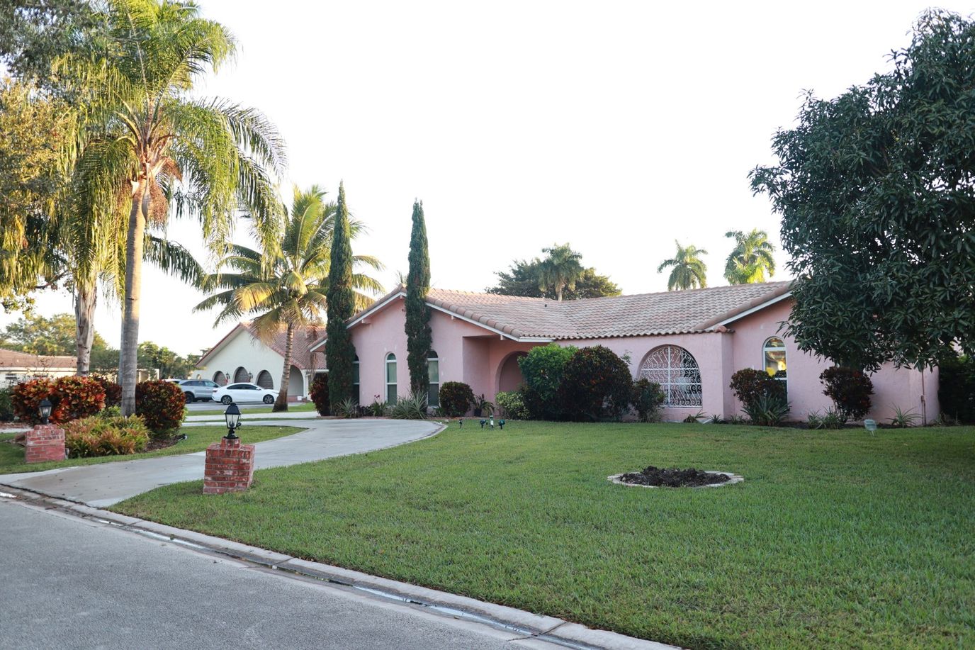 Exterior view of a senior living facility with landscaping
