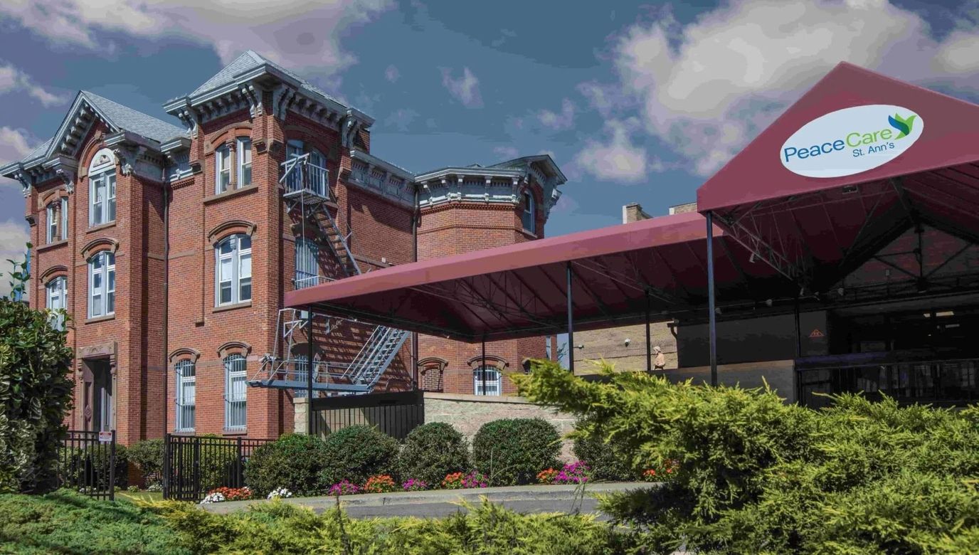 Exterior view of Peace Care St. Ann's building