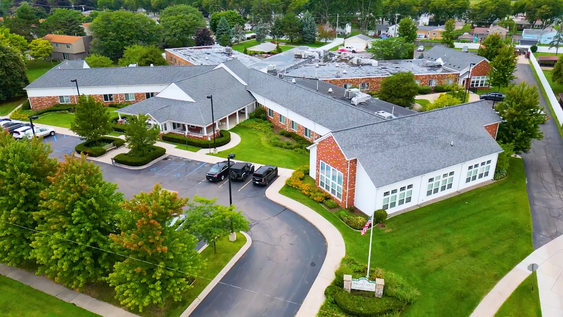 Aerial view of Medilodge of Monroe facility with landscaped grounds