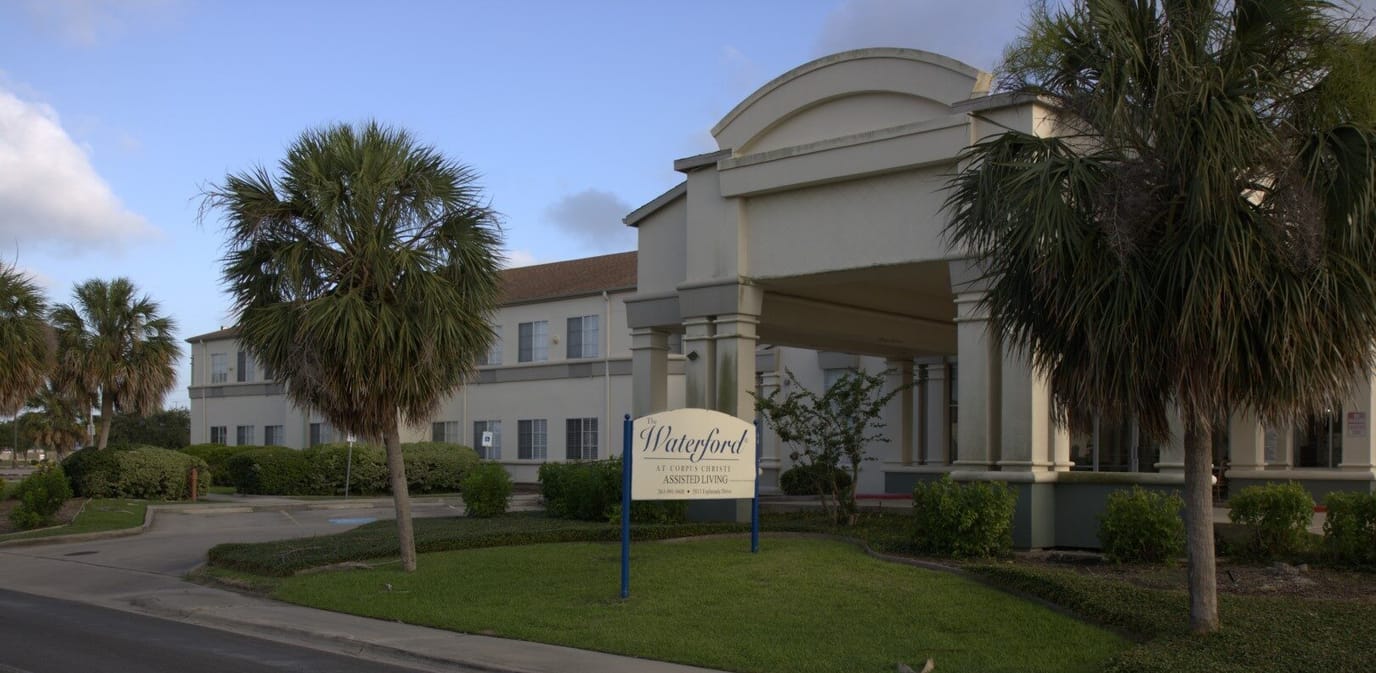 Exterior view of The Waterford facility with signage