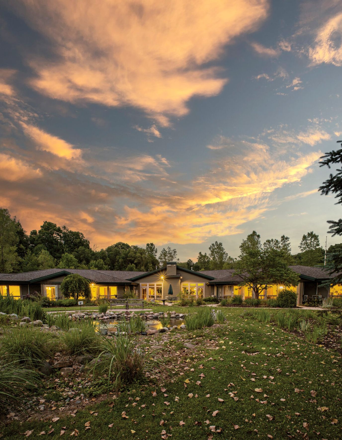 Exterior view of Stoneleigh Residence at sunset