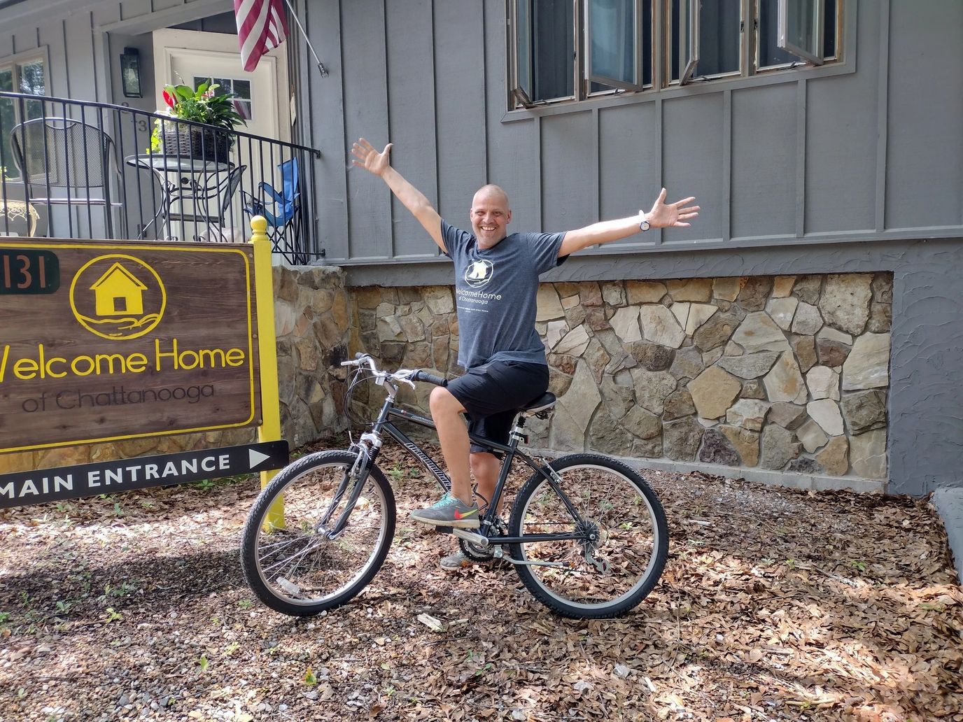 Resident enjoying a bike ride near the entrance