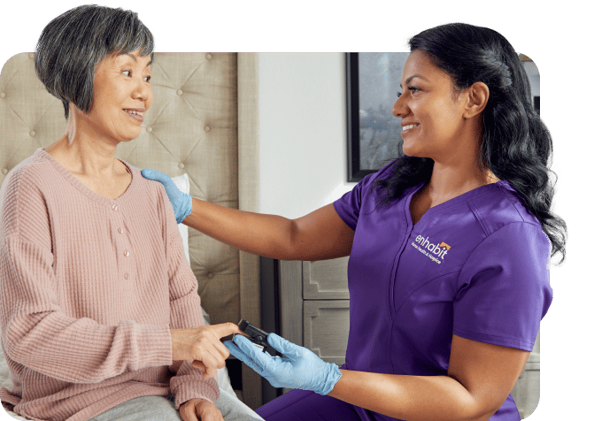 Caregiver interacting with a senior resident