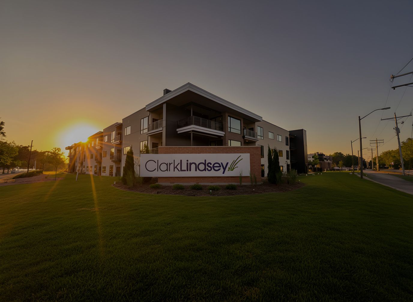 Exterior view of ClarkLindsey facility at sunset