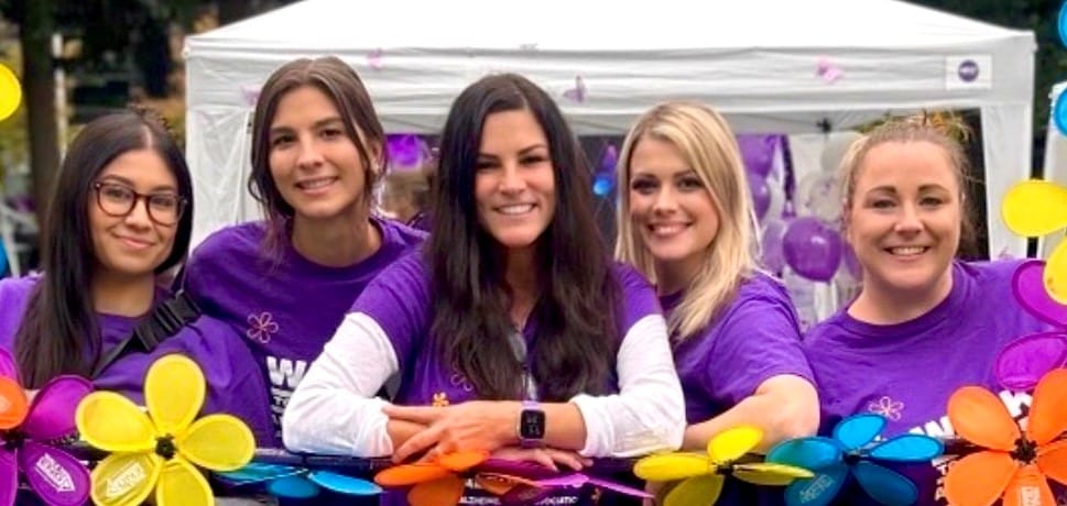 Group of staff members at a community event