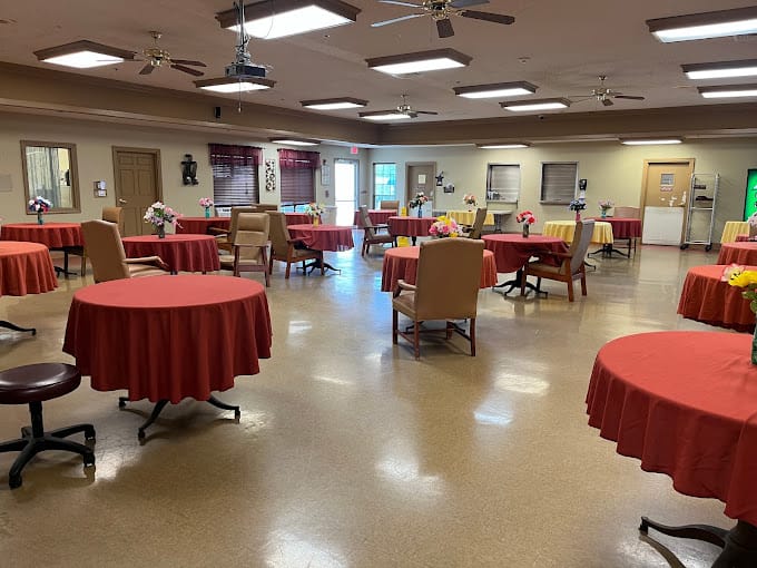Interior view of a common area with tables and chairs
