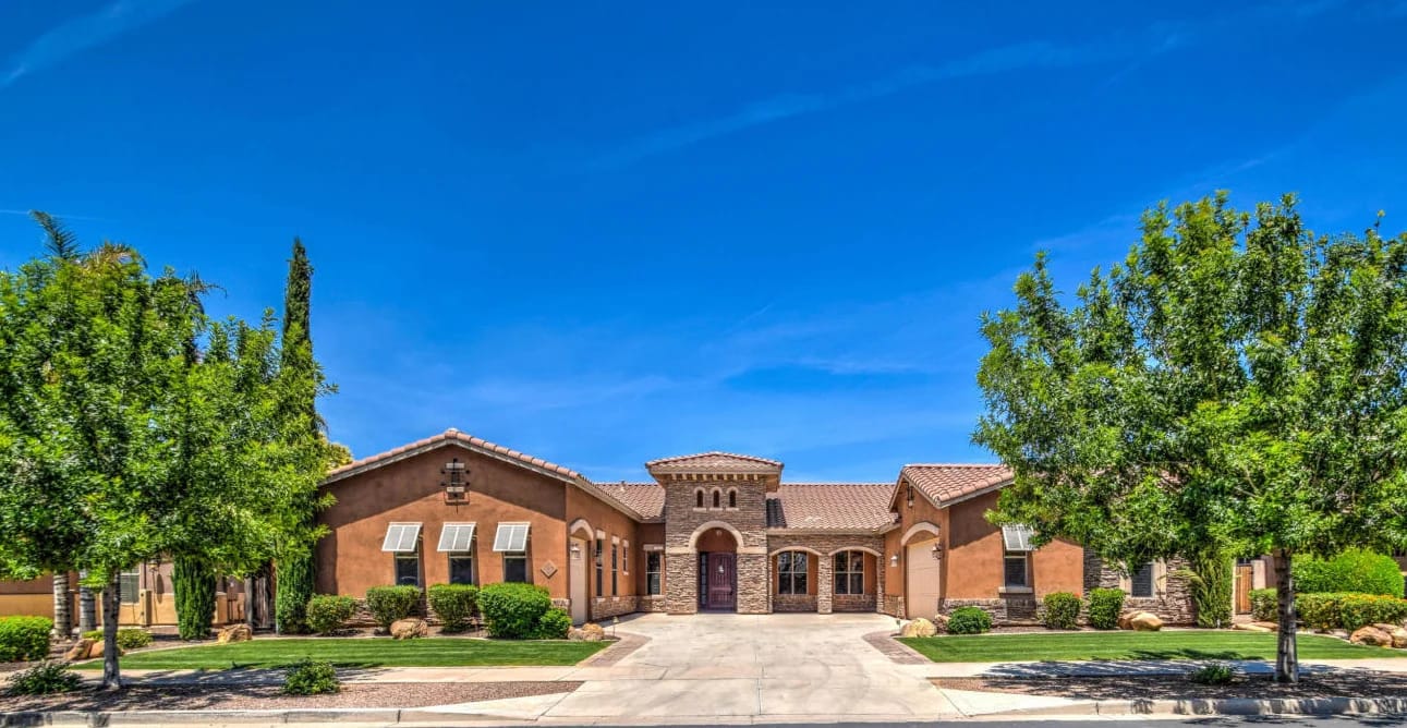 Exterior view of a senior living facility with landscaping