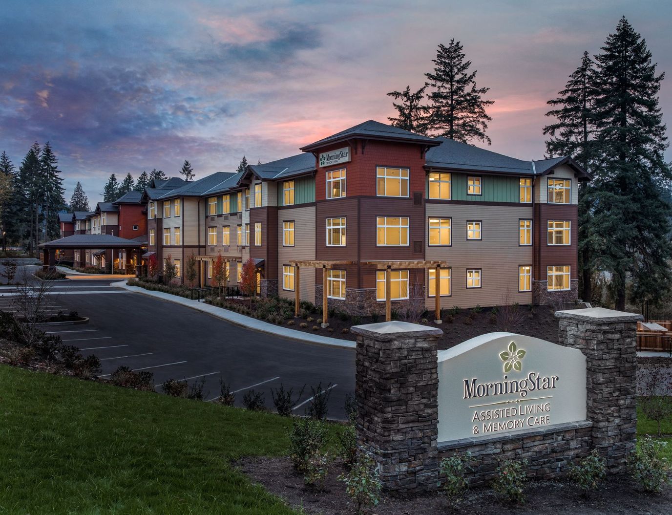 Exterior view of MorningStar assisted living facility at sunset