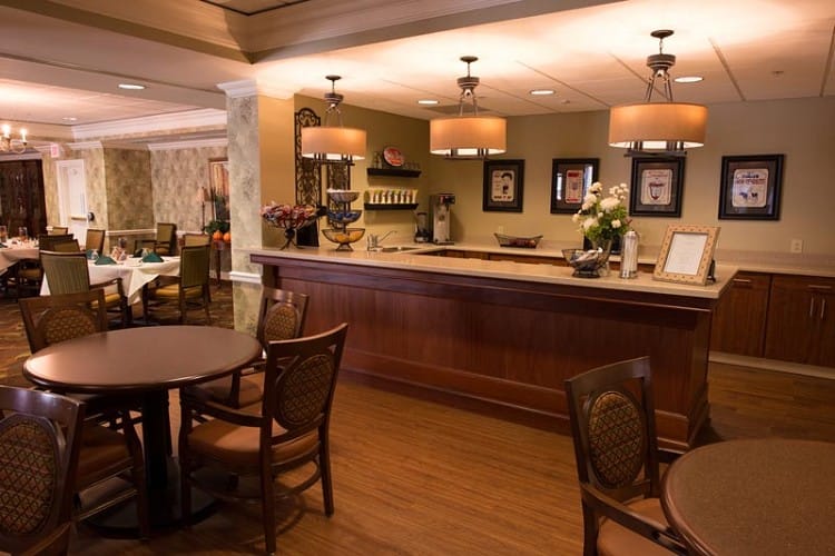 Dining area with seating and decorative lighting