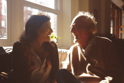 A joyful interaction between a resident and caregiver.