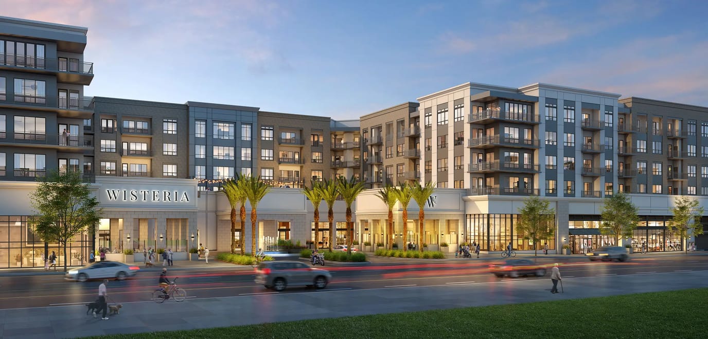 Modern assisted living facility exterior with palm trees