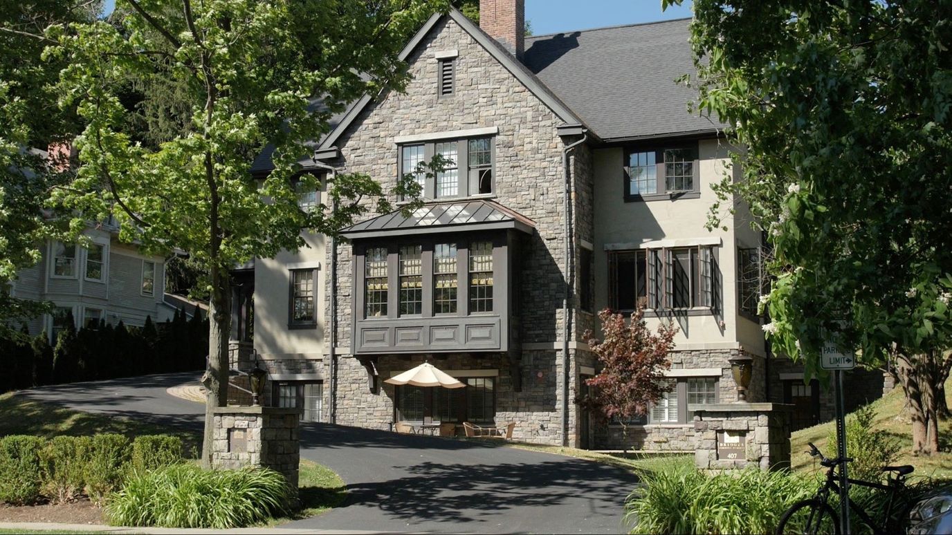Exterior view of a stone nursing home building