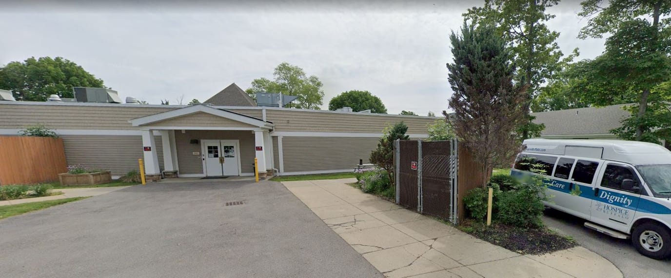Exterior view of the facility with transport vehicle
